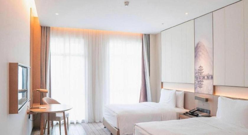 Wanda Jin Baise Hotel Екстериор снимка