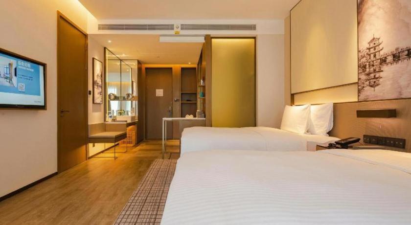 Wanda Jin Baise Hotel Екстериор снимка