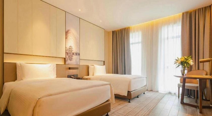 Wanda Jin Baise Hotel Екстериор снимка