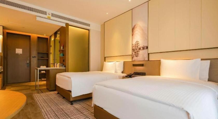 Wanda Jin Baise Hotel Екстериор снимка